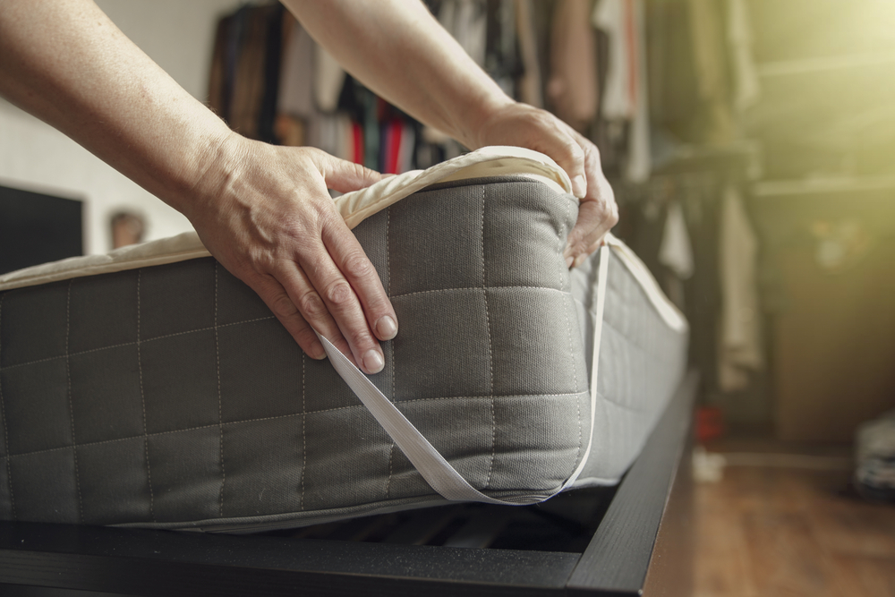 mattress topper sliding off bed