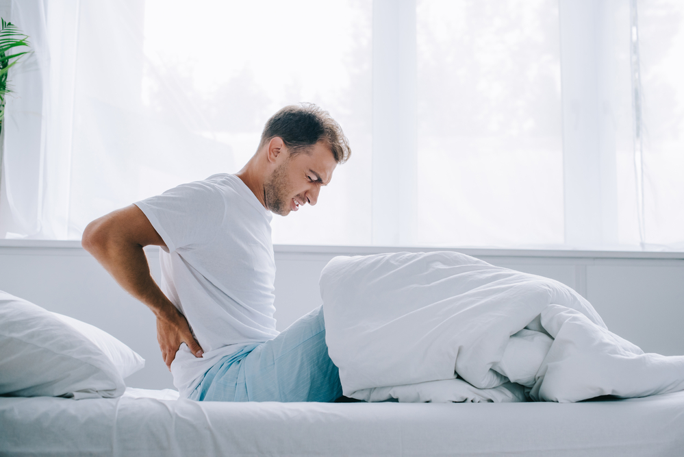 What To Do If You Wake Up With Back Pain? Remedies & Advice